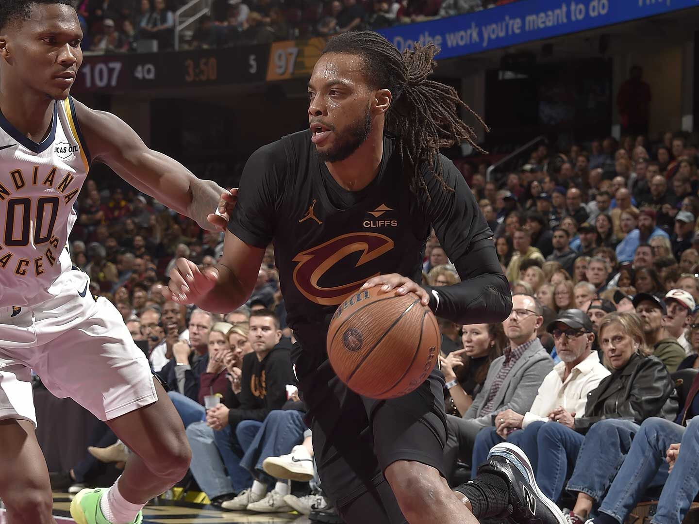 Darius Garland #10 of the Cleveland Cavaliers dribbles the ball during the game against the Indiana Pacers.