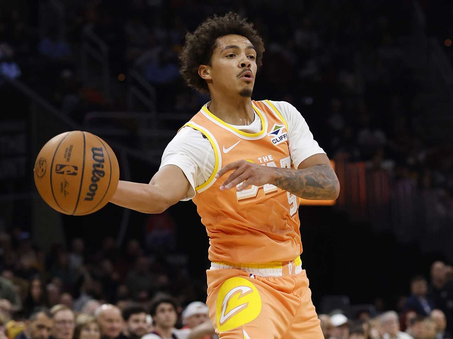 Craig Porter Jr. #9 of the Cleveland Cavaliers passes the ball during the game against the Milwaukee Bucks on November 17, 2025.